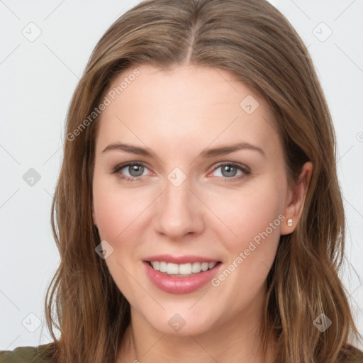 Joyful white young-adult female with long  brown hair and grey eyes