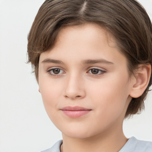 Joyful white child female with medium  brown hair and brown eyes