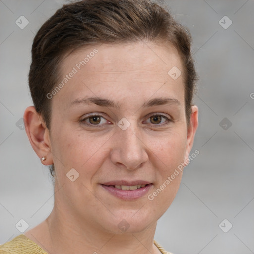 Joyful white adult female with short  brown hair and grey eyes