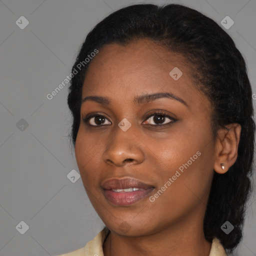 Joyful black young-adult female with medium  black hair and brown eyes