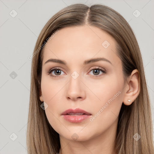 Neutral white young-adult female with long  brown hair and brown eyes