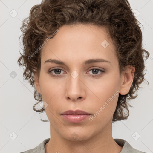 Neutral white young-adult female with short  brown hair and brown eyes