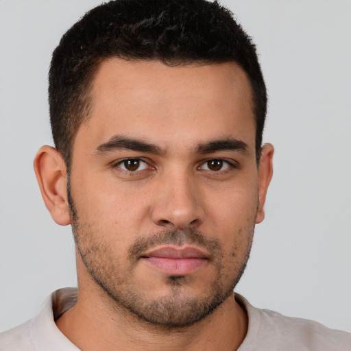 Neutral white young-adult male with short  brown hair and brown eyes