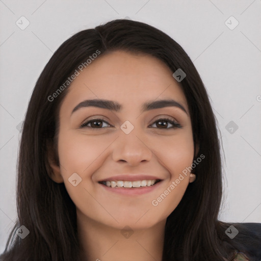 Joyful white young-adult female with long  black hair and brown eyes