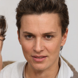 Joyful white adult female with short  brown hair and brown eyes