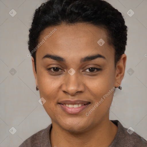 Joyful black young-adult female with short  black hair and brown eyes