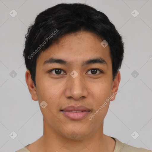 Joyful asian young-adult male with short  black hair and brown eyes