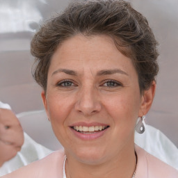 Joyful white adult female with short  brown hair and brown eyes