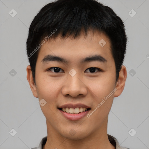 Joyful asian young-adult male with short  black hair and brown eyes