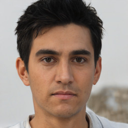 Neutral asian young-adult male with short  brown hair and brown eyes