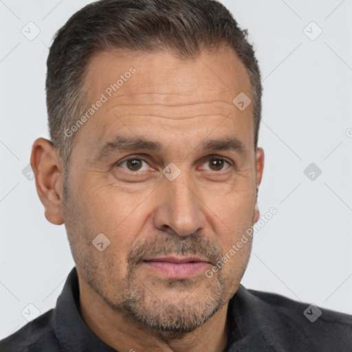 Joyful white middle-aged male with short  brown hair and brown eyes