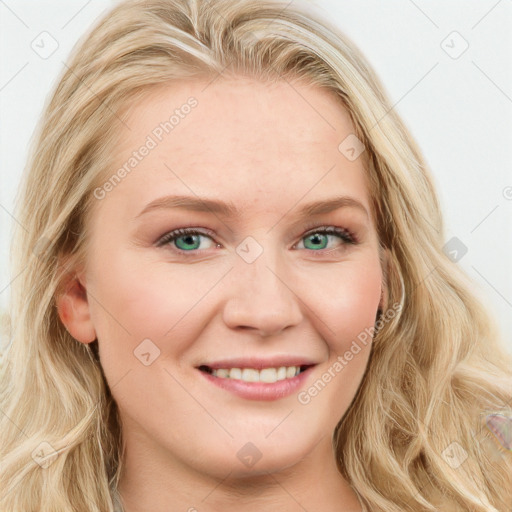 Joyful white young-adult female with long  brown hair and blue eyes