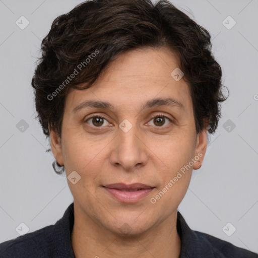 Joyful white adult female with short  brown hair and brown eyes