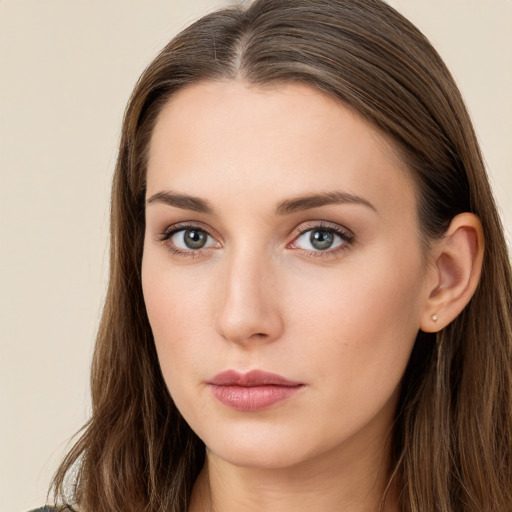 Neutral white young-adult female with long  brown hair and grey eyes