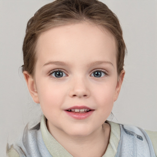 Joyful white child female with medium  brown hair and blue eyes