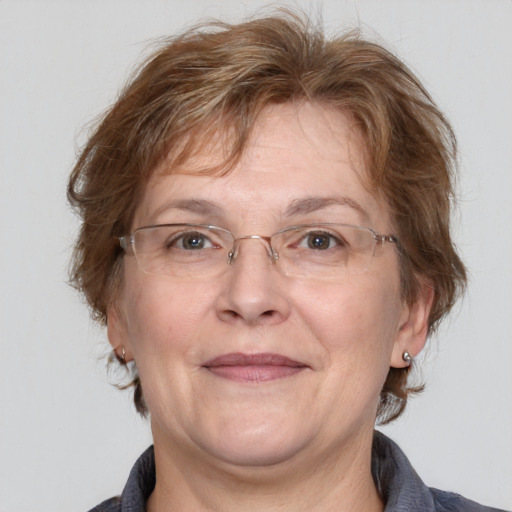 Joyful white middle-aged female with medium  brown hair and grey eyes