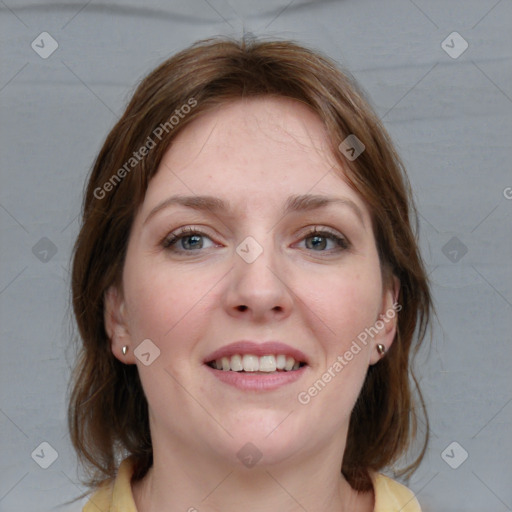 Joyful white young-adult female with medium  brown hair and blue eyes