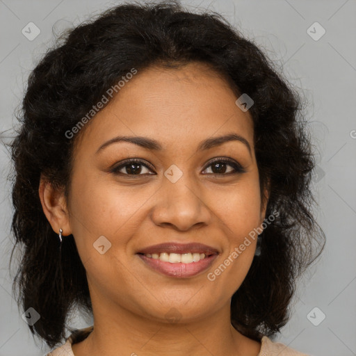 Joyful latino adult female with medium  brown hair and brown eyes