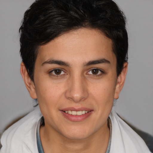 Joyful white young-adult female with short  brown hair and brown eyes