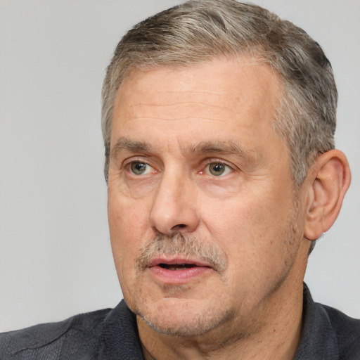 Neutral white middle-aged male with short  brown hair and brown eyes