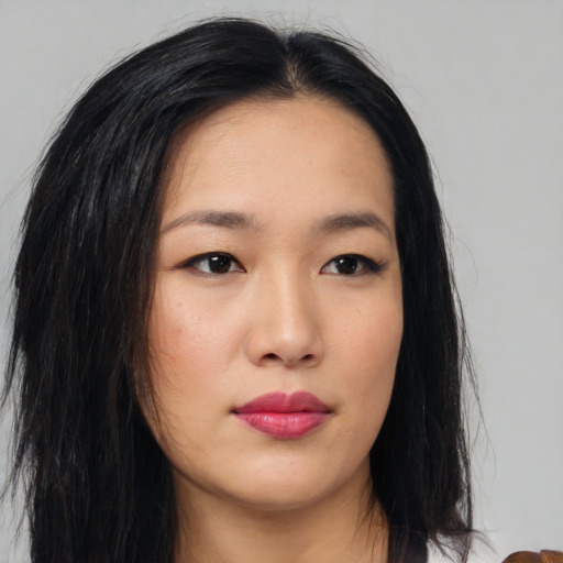 Neutral asian young-adult female with medium  brown hair and brown eyes