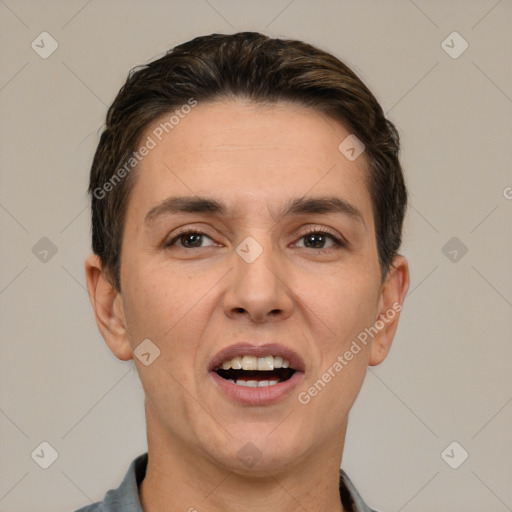 Joyful white adult male with short  brown hair and brown eyes