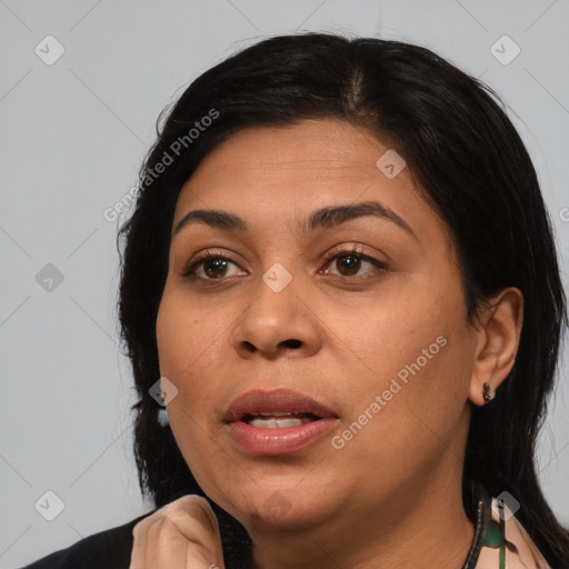 Joyful latino young-adult female with medium  brown hair and brown eyes