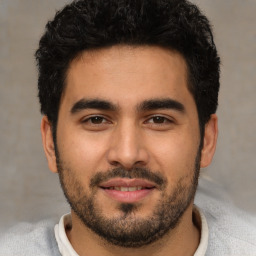 Neutral white young-adult male with short  black hair and brown eyes