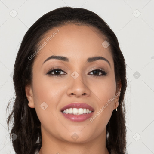 Joyful white young-adult female with long  black hair and brown eyes