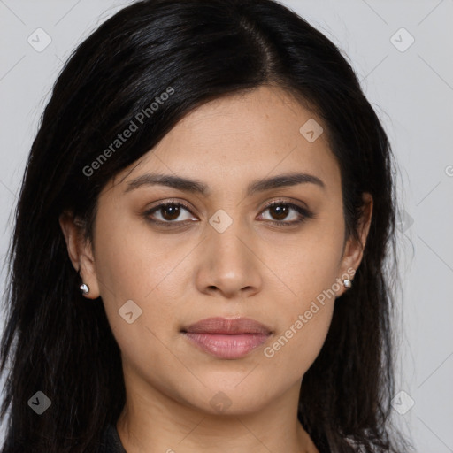 Joyful asian young-adult female with long  brown hair and brown eyes