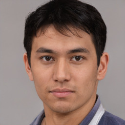 Neutral asian young-adult male with short  brown hair and brown eyes