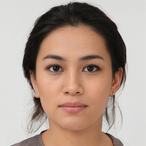 Neutral asian young-adult female with medium  black hair and brown eyes