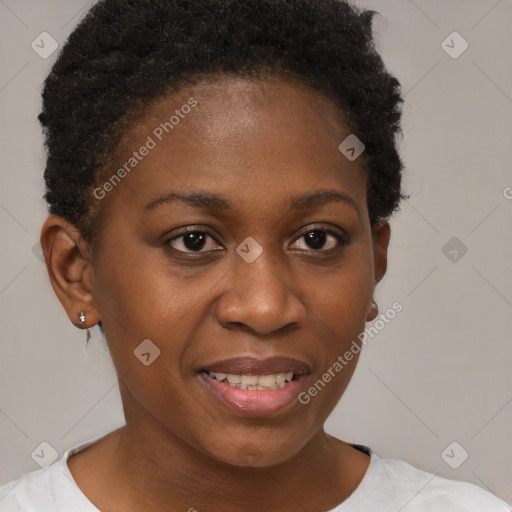 Joyful black young-adult female with short  brown hair and brown eyes