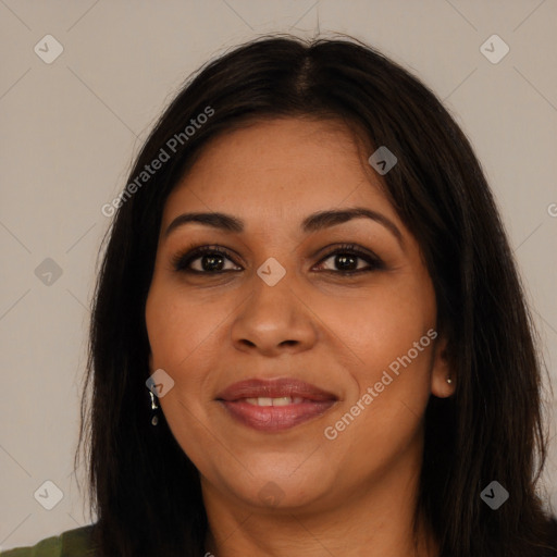 Joyful latino young-adult female with long  brown hair and brown eyes