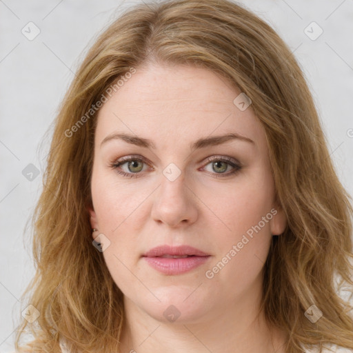 Joyful white young-adult female with long  brown hair and green eyes