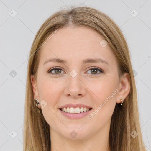 Joyful white young-adult female with long  brown hair and green eyes