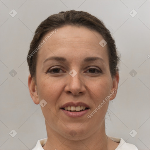 Joyful white adult female with short  brown hair and brown eyes