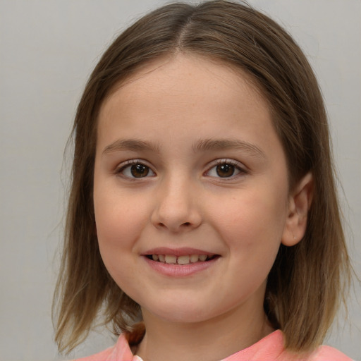 Joyful white child female with medium  brown hair and brown eyes