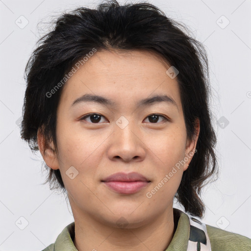 Joyful asian young-adult female with medium  brown hair and brown eyes