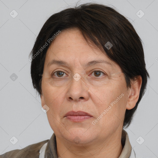 Joyful white adult female with medium  brown hair and brown eyes