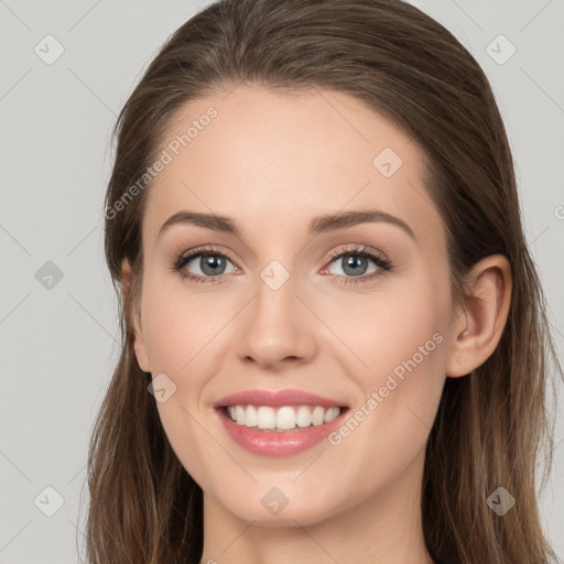 Joyful white young-adult female with long  brown hair and grey eyes