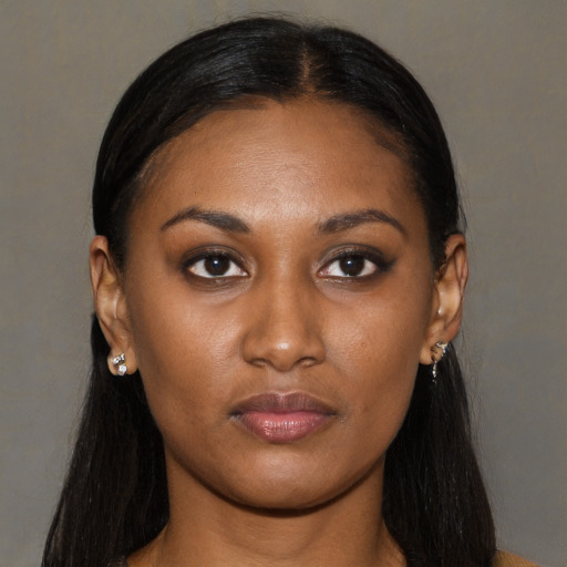 Neutral black young-adult female with long  black hair and brown eyes