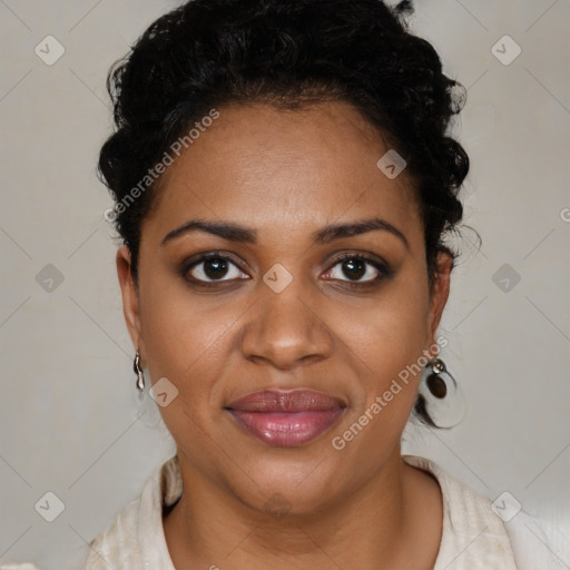 Joyful black adult female with short  brown hair and brown eyes