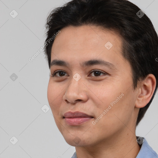 Joyful white young-adult male with short  black hair and brown eyes