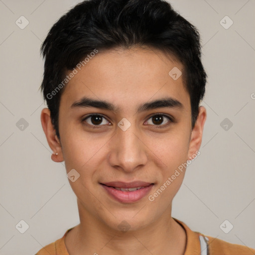 Joyful latino young-adult male with short  brown hair and brown eyes