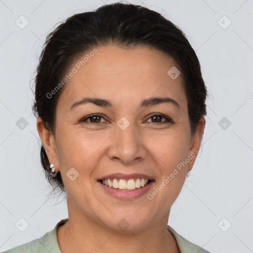 Joyful white adult female with short  brown hair and brown eyes