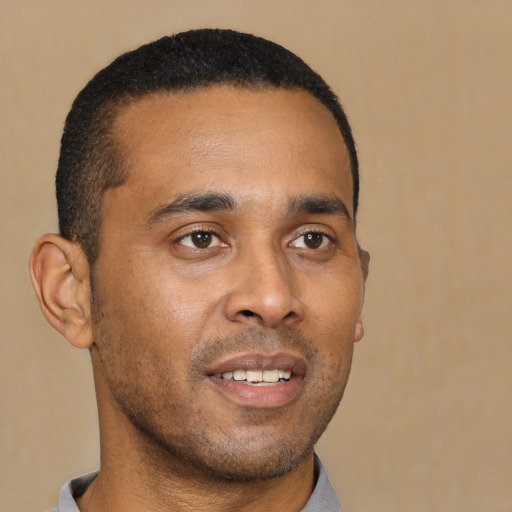 Neutral black young-adult male with short  brown hair and brown eyes