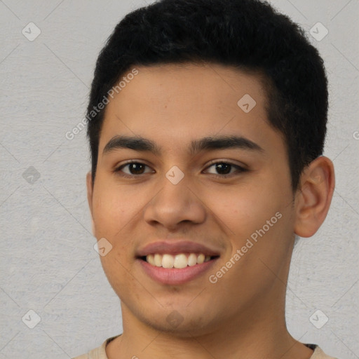 Joyful latino young-adult male with short  black hair and brown eyes