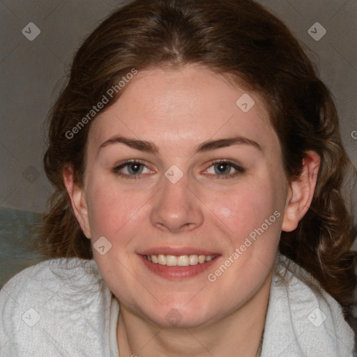 Joyful white young-adult female with medium  brown hair and blue eyes