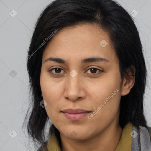 Joyful asian young-adult female with long  brown hair and brown eyes